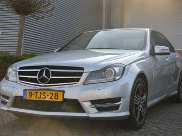 Mercedes-Benz C-Klasse 180 AUTOMAAT | EDITION | AMG | XENON | TREKHAAK | NAVI | CRUISE |